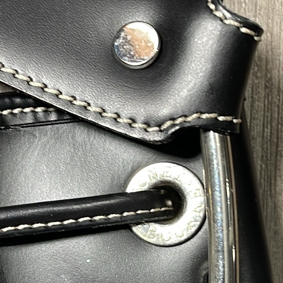Dooney Bourke large leather drawstring bucket bag. Stunning leather. Signature - Picture 5 of 11